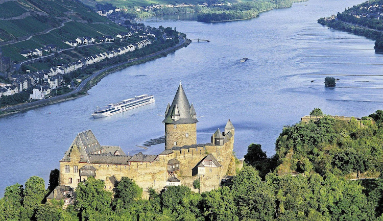 Viking Hermod sails past a 12th century castle in Stahleck, Germany. The ship offers cruises on the Danube, the Rhine and through the heart of Normandy in northern France. 