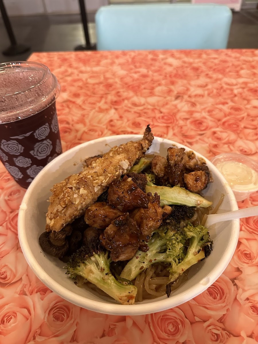 Sweet potato noodles (double portion), broccoli, mushrooms, almost baked chicken, bbq chicken, and creamy white ginger - all GF