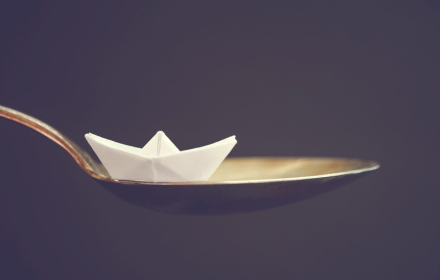 Paper boat and iron spoon small promo image