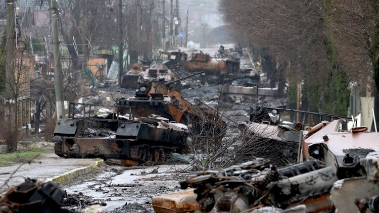 A Bucha street littered with destroyed Russian armoury