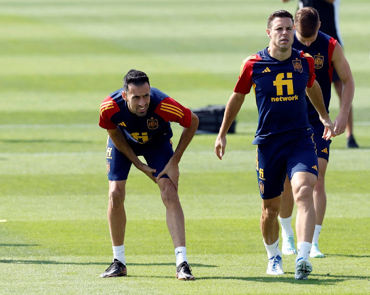 Spain's Sergio Busquets and Cesar Azpilicueta during training.