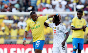 Andile Jali of Mamelodi Sundowns with Ndabayithethwa Ndlondlo of Orlando Pirates during the 2022 MTN8 semifinal first leg match at Orlando Stadium on October 1 2022.