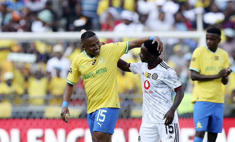 Andile Jali of Mamelodi Sundowns with Ndabayithethwa Ndlondlo of Orlando Pirates during the 2022 MTN8 semifinal first leg match at Orlando Stadium on October 1 2022.