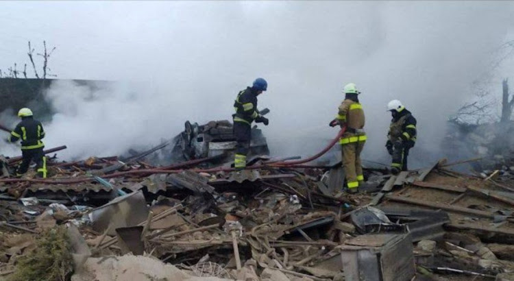 Firefighters work at the site of a residential area hit by a Russian military strike in the town of Pavlohrad, Ukraine May 1 2023. Picture: DNIPROPETROVSK REGIONAL MILITARY CIVIL ADMINISTRATION/TELEGRAM/REUTER