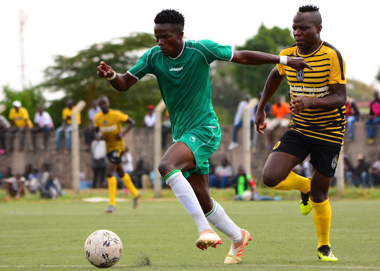 Nairobi Stima's Curtis Wekesa charges past Wilson Anekeya of Wazito in a recent NSL match