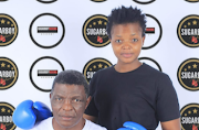 Former WBC super-middleweight champion Sugarboy Malinga and his daughter Nomfundo.