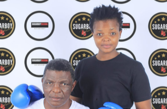 Former WBC super-middleweight champion Sugarboy Malinga and his daughter Nomfundo.