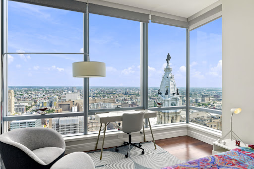 Desk with panoramic city view in this luxury apartment / penthouse for sale in Philadelphia ($1,675,000)