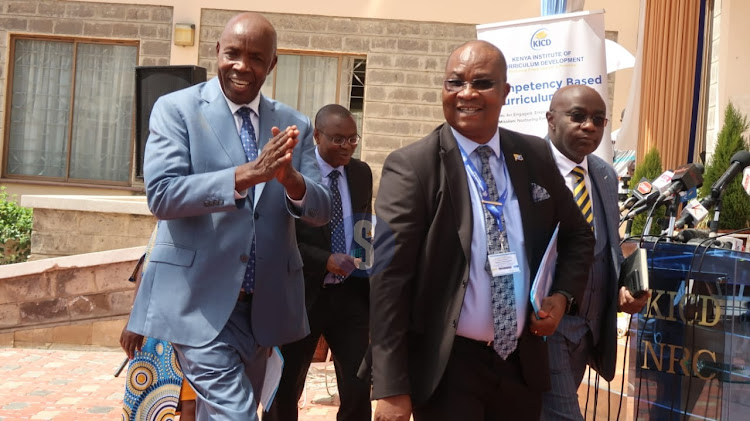 Education CS Ezekiel Machogu, KICD CEO Charles Ongondo and Publishers Association Chair Kiarie Kamau during the launch of the national Grade 7 textbook distribution exercise at the KICD Nairobi on Friday, January 27, 2023.