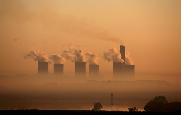 Steam rises at sunrise from the Lethabo Power Station. File picture: REUTERS/SIPHIWE SIBEKO.