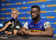 The DHL Stormers captain Siya Kolisi alongside his coach Robie Fleck during the team's pre-match press conference at Newlands Rugby Stadium on May 10 2018.    