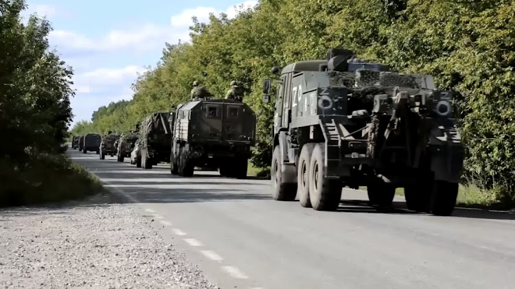 A Russian military convoy heads towards the frontline in Ukraine's Kharkiv region, at an unidentified location, in this still image from a video released by the Russian defence ministry on September 9 2022.