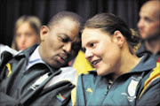 KICKER: Team South Africa Paralypic 2008 member and five gold medalist Natalie Du Toit and Mos Mashishi on arrival at OR Tambo Airport. Picture By : Tsheko Kabasia. 21/09/08. ©  Sunday World.