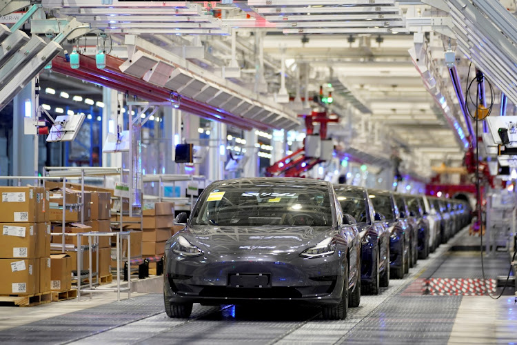 Tesla China-made Model 3 vehicles are shown during a delivery event at its factory in Shanghai, China, in this January 7 2020 file photo. Picture: REUTERS/ALY SONG