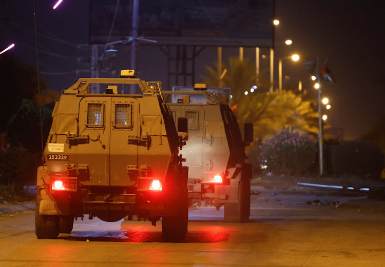 Israeli military vehicles operate in Jericho in the Israeli-occupied West Bank on May 25 2023. Violence in the West Bank has surged for more than a year with increased Israeli raids, Palestinian street attacks and settler rampages in Palestinian villages.