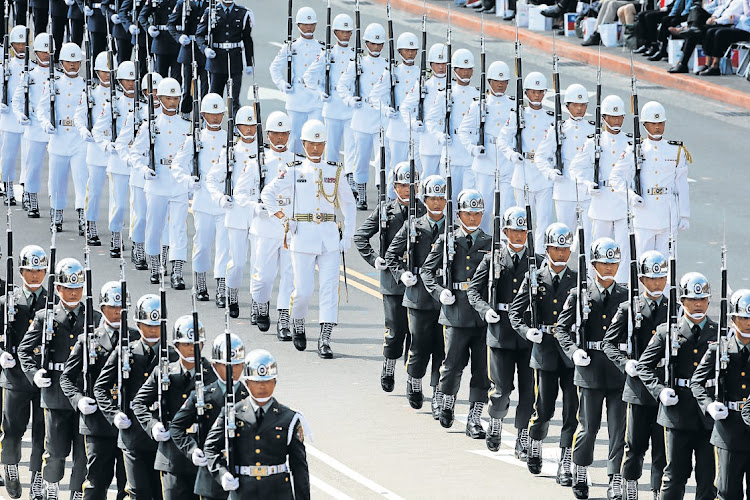 Military honour guards attend National Day celebrations in front of the Presidential Palace in Taipei, Taiwan, in this October 10 2019 file photo. Picture: REUTERS/EASON LAM