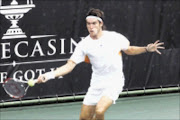 TOP SPIN: Argentina's Leonardo Mayer en route to a 6-2 6-4 victory against compatriot Sergio Roitman during their South African Open match at Montecasino yesterday. 02/02/09. Pic. Bafana Mahlangu. © Sowetan.