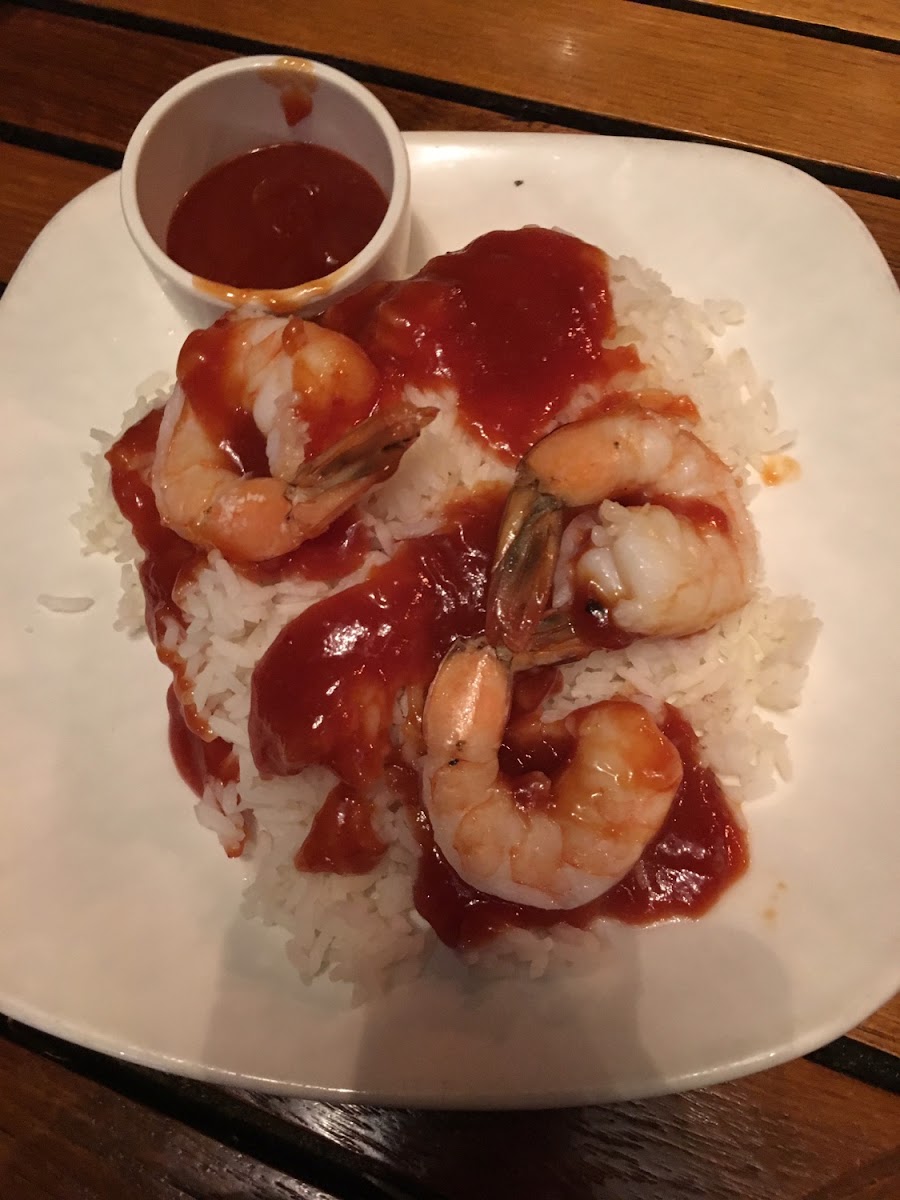 Gf shrimp over steamed rice with BBQ sauce ( They have gf soy sauce too)