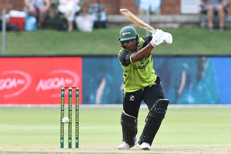 Sinethemba Qeshile of the Warriors follows through on a shot during the CSA T20 Challenge match against the Dragons at St George’s Park.