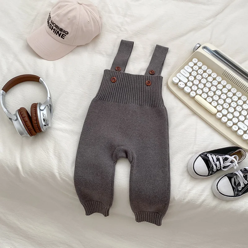 Ins Style Baby Autumn Clothing Knitted Bib Jumpsuit. Keep your baby cozy and stylish this fall. Perfect for cooler weath