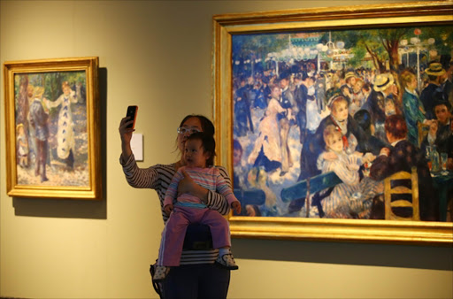 Those of us who want to admire art - like Renoir's 'Dance at le Moulin de la Galette' - in an atmosphere of decorum would like a ban on people taking selfies in museums and galleries