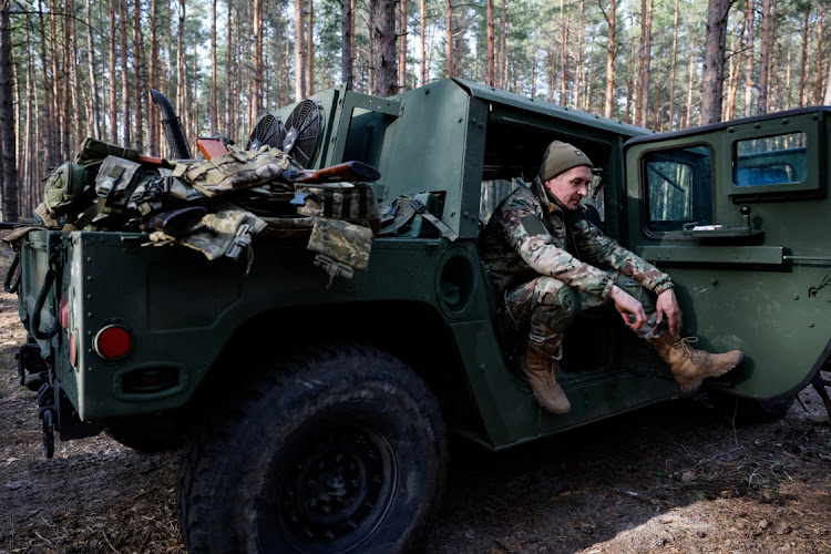 A recruit of the Steel Border storm brigade rests, after practising at the unit's base in central Ukraine, March 24 2023. Picture: REUTERS