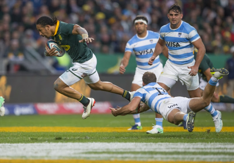 Courtnall Skosan of the Springbok Team and Emiliano Boffelli of Argentina during the Rugby Championship match between South Africa and Argentina at Nelson Mandela Bay Stadium on August 19, 2017 in Port Elizabeth, South Africa.