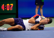 Carlos Alcaraz of Spain in disbelief after beating Stefanos Tsitsipas of Greece on day five of the 2021 US Open tennis tournament at USTA Billie King National Tennis Center.