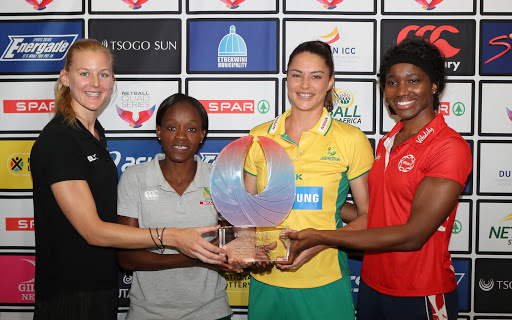 Katrina Grant (Captain of the New Zealand Ferns), Bongi Msomi (Captain of the Spar Proteas), Sharni Layton (Captain of the Australian Diamonds) and Ama Agbeze (Captain of the England Roses) with the trophy during the Netball Quad Series media briefing at International Convention Centre on January 26, 2017 in Durban, South Africa. (Photo by Reg Caldecott/Gallo Images