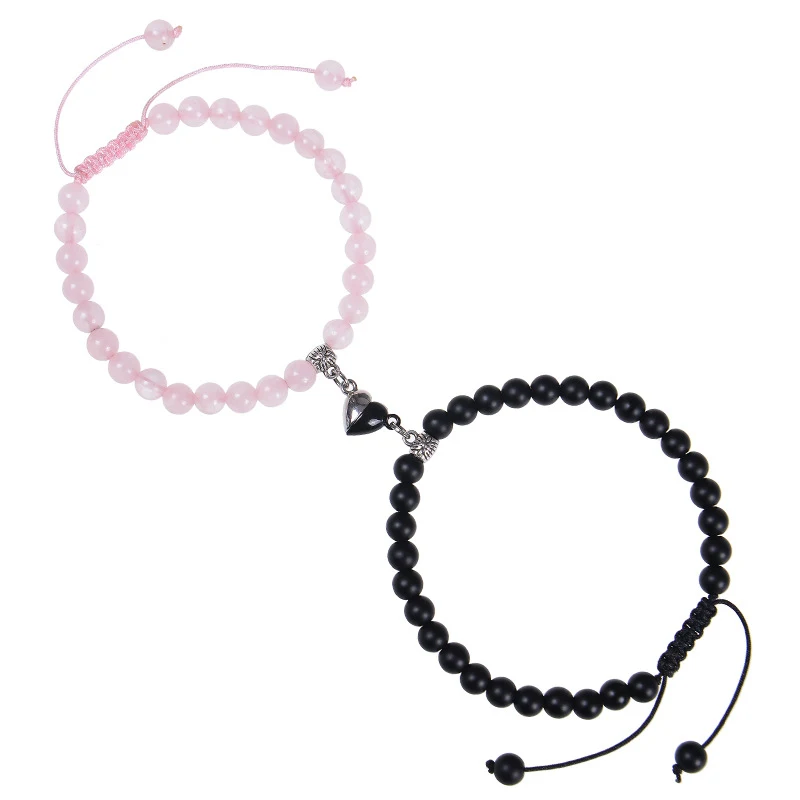 Bracelet couple aimant cœur, pierre noire mate à succion. Un lien unique, une attraction irrésistible pour votre amour.