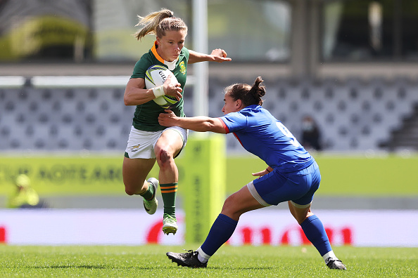 Nadine Roos of South Africa is tackled by Laure Sansus of France during the Pool C Rugby World Cup 2021 New Zealand match between South Africa and France at Eden Park on October 08, 2022, in Auckland, New Zealand.