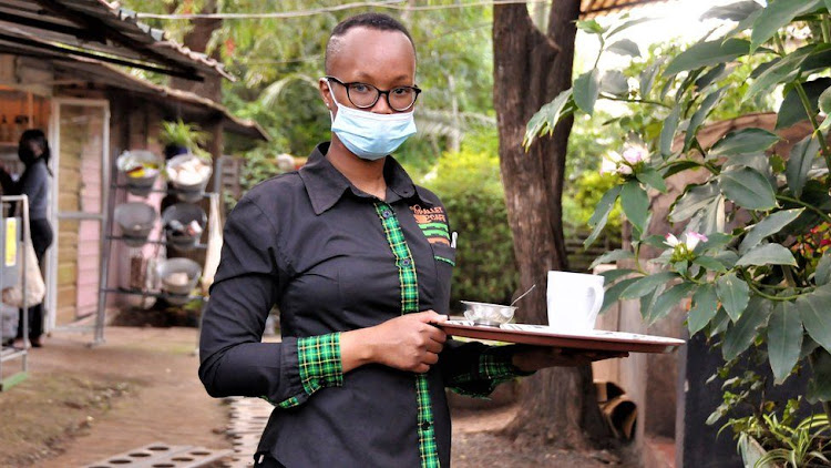 Sharon Cherono is one of the more than 30 staff at Pallet Cafe who is deaf