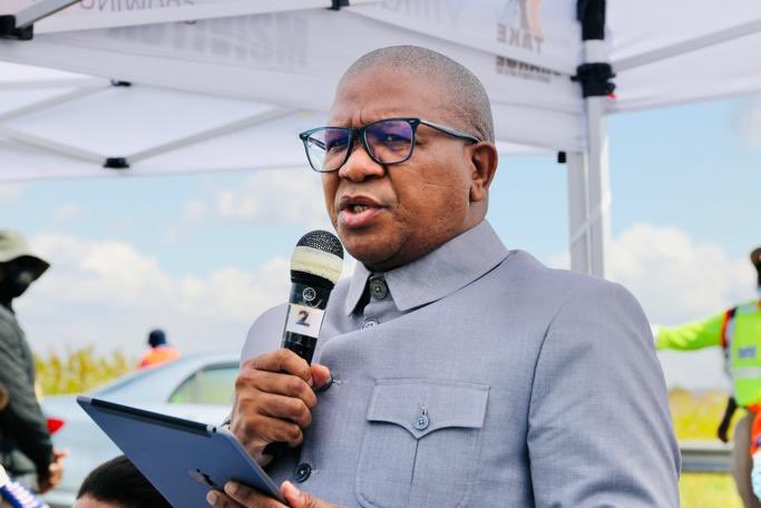 Transport minister Fikile Mbalula speaks to reporters on the N12 highway in Ekurhuleni on April 21.