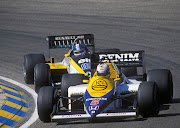 Nigel Mansell of Great Britain ahead of compatriot Derek Warwick during the last Dutch Grand Prix in August 1985 in Zandvoort, Netherlands. 