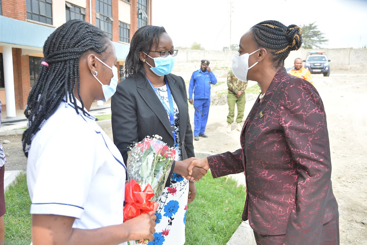 The acting CS for Energy Monica Juma (R) is received by the Superintendent in charge of Naivasha sub-county hospital Dr Angeline Ithondeka (C) during the opening of the Sh331m outpatient wing. The wing that has been constructed by Kengen and Nakuru county government will offer specialized treatment that will mainly target trauma patients.