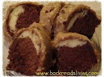 German Chocolate Cream Cheese Cake with Coconut Pecan Icing was pinched from <a href="http://www.backroadsliving.com/recipes/cakes-recipes/german-chocolate-cream-cheese-cake-coconut-pecan-icing/" target="_blank">www.backroadsliving.com.</a>