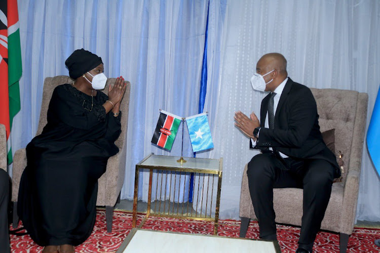 Foreign Affairs CS Ambassador Raychelle Omamo and her Somalia counterpart Mohamed Abdirizak hold bilateral talks in Mogadishu on August 8.