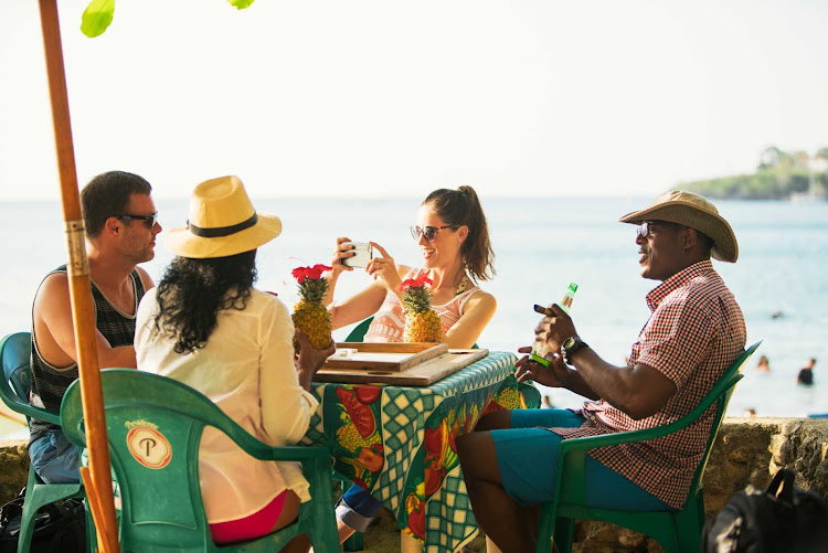 Socialize with the local community in the Dominican Republic.