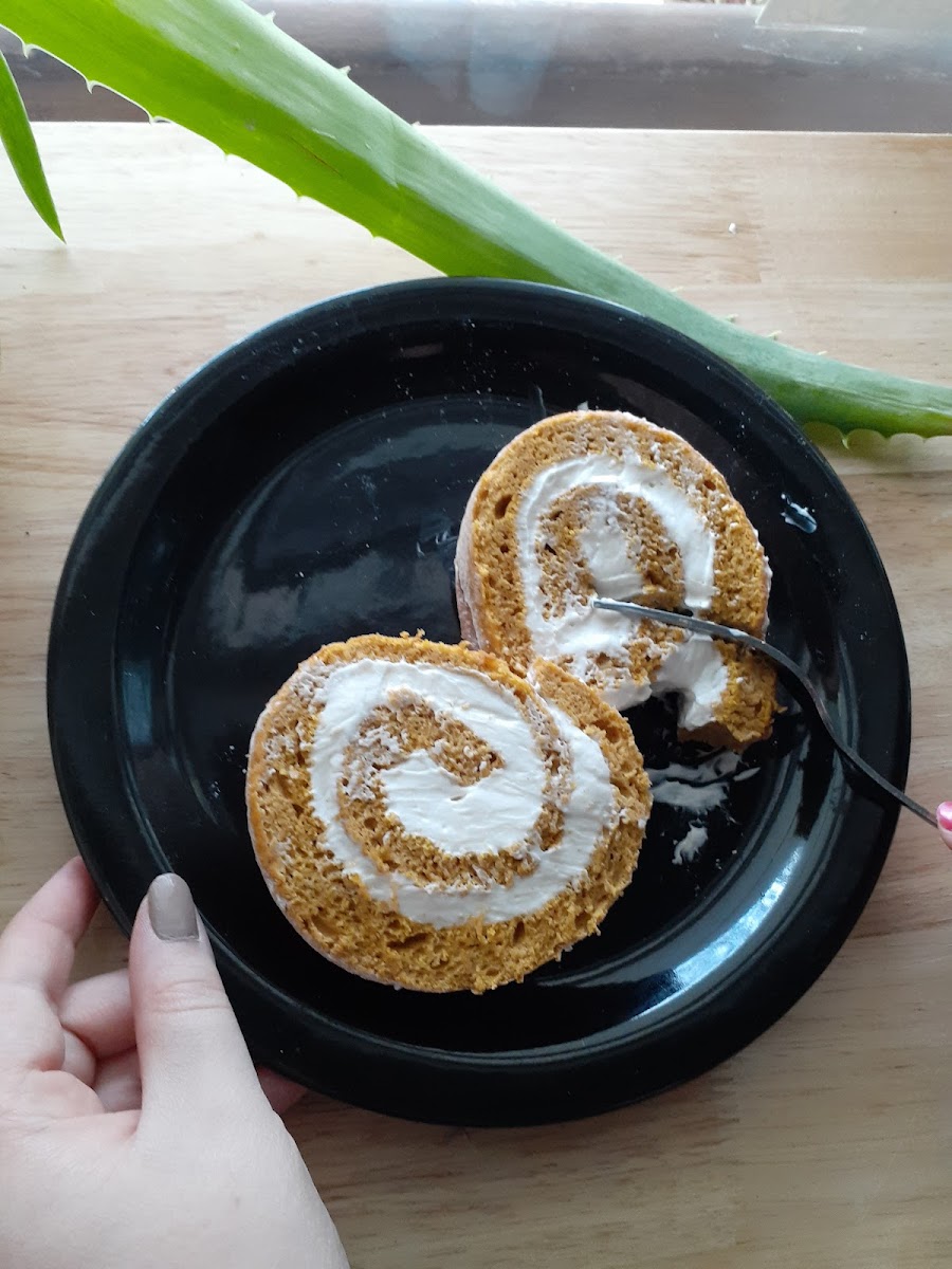 Pumpkin roll, filled with a local maple chai cream cheese filling, a seasonal treat