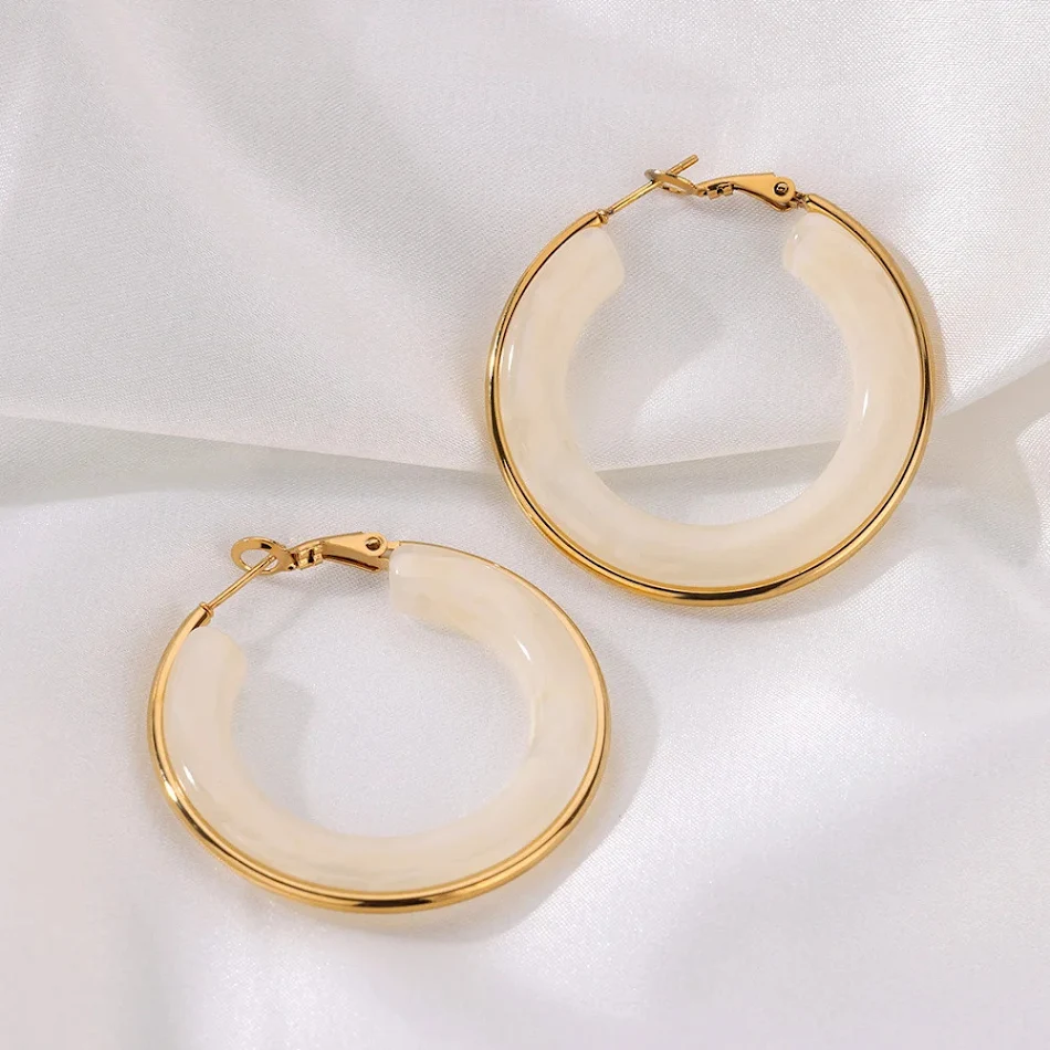 Boucles d'oreilles vintage imitation jade en résine acrylique pour femmes. Un bijou féminin pour un look élégant et intemporel, idéal au quotidien.