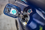 A car at a hydrogen filling station.