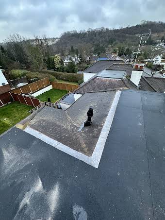 Structural building out and installing a table top flat roof 3 layer torch on album cover