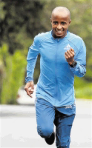 OCTOBER 28, 2014 Lusapho April shows his form before flying out to compete in the New York Marathon.