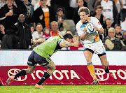 Cheetahs flyhalf Johan Goosen has been ruled out for up to four month after dislocated his shoulder while scoring a sensational individual try against the Hurricanes on Saturday. The Free state side lost 36-33 Picture: LOREN BATTERSBY/GALLO IMAGES