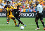 Sifiso Myeni of Orlando Pirates in action with Willard Katsande of Kaizer Chiefs during the Absa Premiership match between Orlando Pirates and Kaizer Chiefs. Picture Credit: Gallo Images