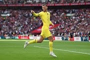 Mason Mount of Chelsea celebrates after scoring his side's second goal in the FA Cup semifinal against Crystal Palace at Wembley Stadium in London on April 17 2022.