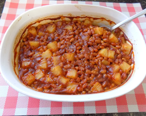 Pineapple baked beans in casserole dish