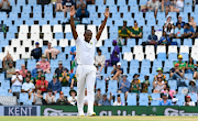 Proteas fast bowler Kagiso Rabada celebrates taking the wicket of Rohit Sharma of India on day one of the first Test at SuperSport Park in Centurion on Tuesday. 