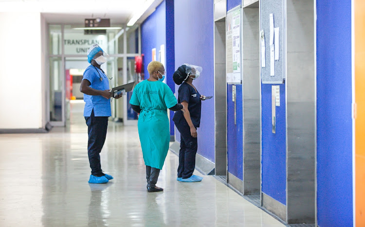 Health-care workers at Charlotte Maxeke Johannesburg Academic Hospital in Johannesburg. Picture: GALLO IMAGES/SHARON SERETLO