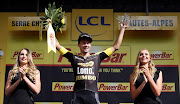 Cycling - The 104th Tour de France cycling race - The 183-km Stage 17 from La Mure to Serre-Chevalier, France - July 19, 2017 - Lotto NL-Jumbo rider Primoz Roglic of Slovenia celebrates his win on the podium. REUTERS/Christian Hartmann